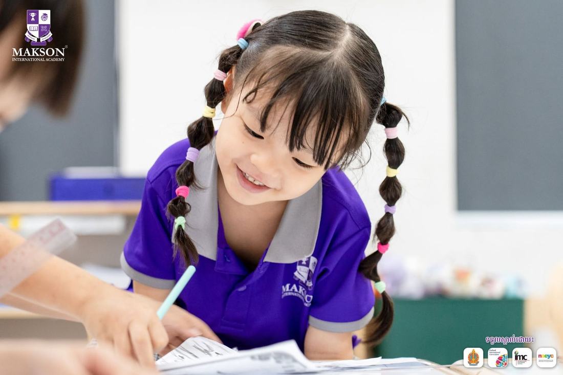 A young child drawing