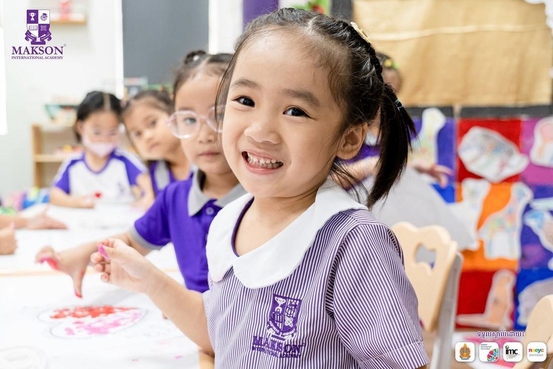 A smiling MAKSON student