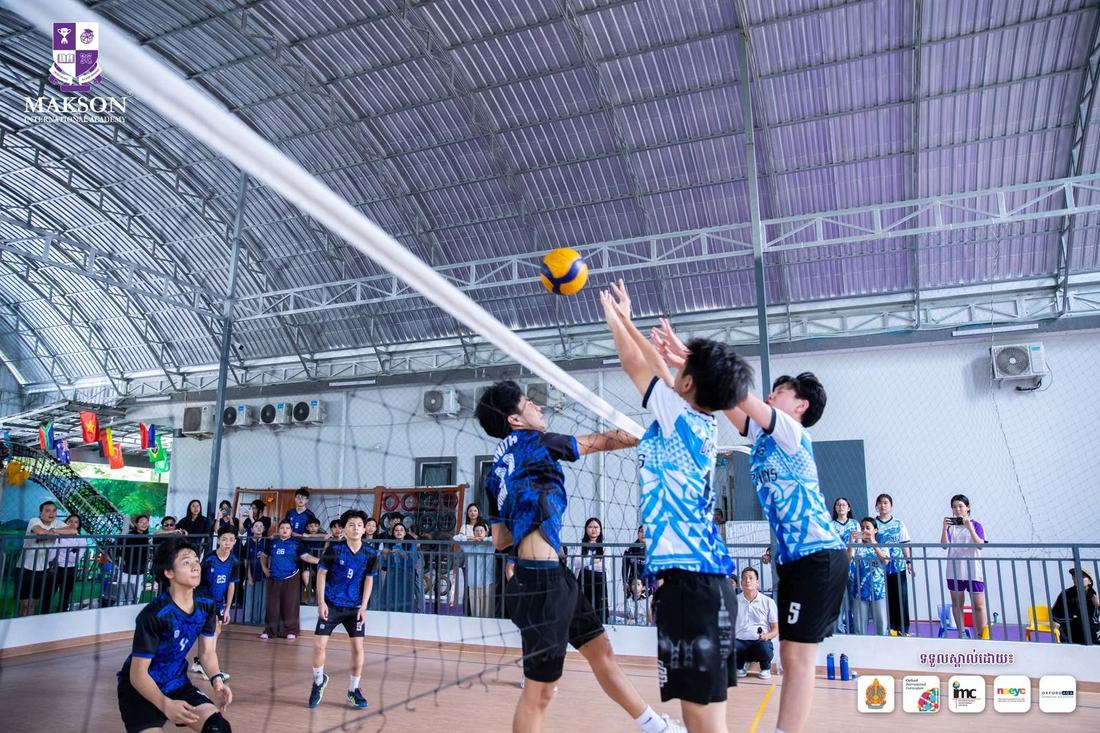 Students playing volleyball
